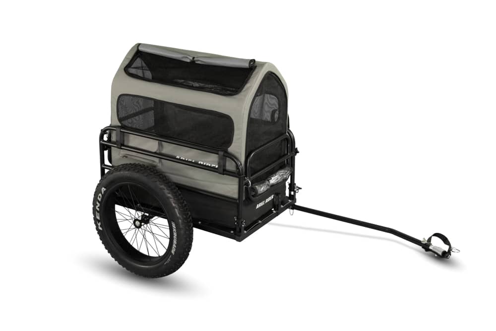 Ariel Rider dog carrier trailer with grey mesh canopy, side angled view.
