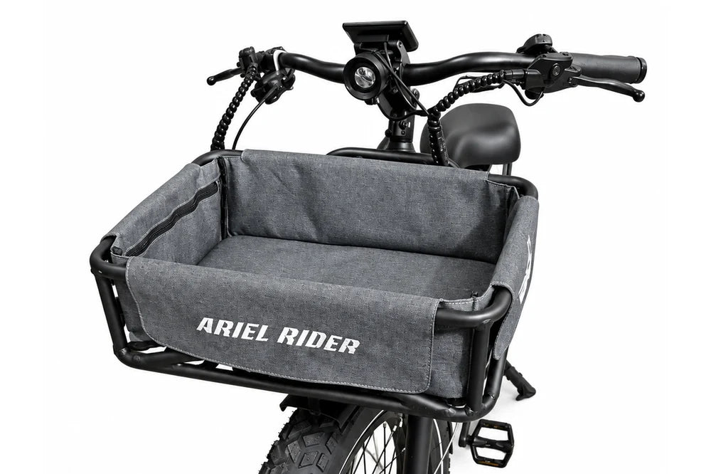 Front view of the Ariel Rider cargo basket and gray liner mounted below the handlebars of a red Kepler.