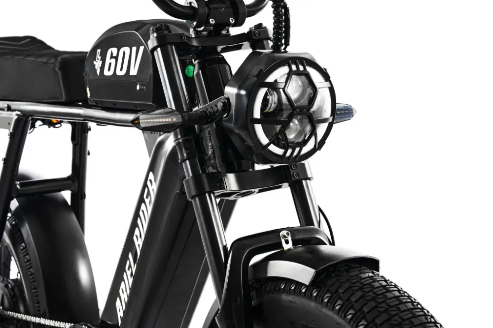 Close-up of a black electric bike with '6OV' branding on a white background #Version_Cafe Racer