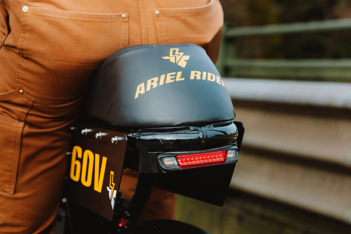 High-security U-lock securing an e-bike to a sturdy bike rack in an urban setting to prevent theft.
