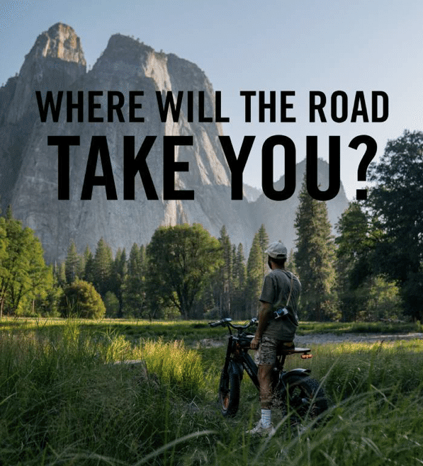 Cyclist with electric bike overlooking Yosemite Valley at sunrise — exploring scenic e-bike destinations in the USA with Ariel Rider.