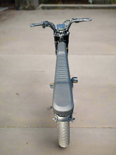 Load image into Gallery viewer, Gray electric bike on a concrete surface
