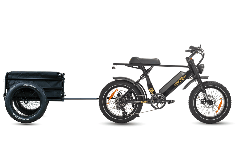 Ariel Rider X-Class 52V in red and black pulling the cargo trailer, side view.