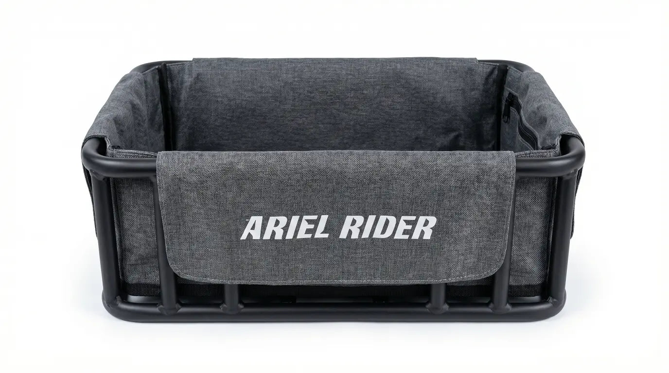 Front view of gray Ariel Rider Cargo Basket Liner installed in a black cargo basket