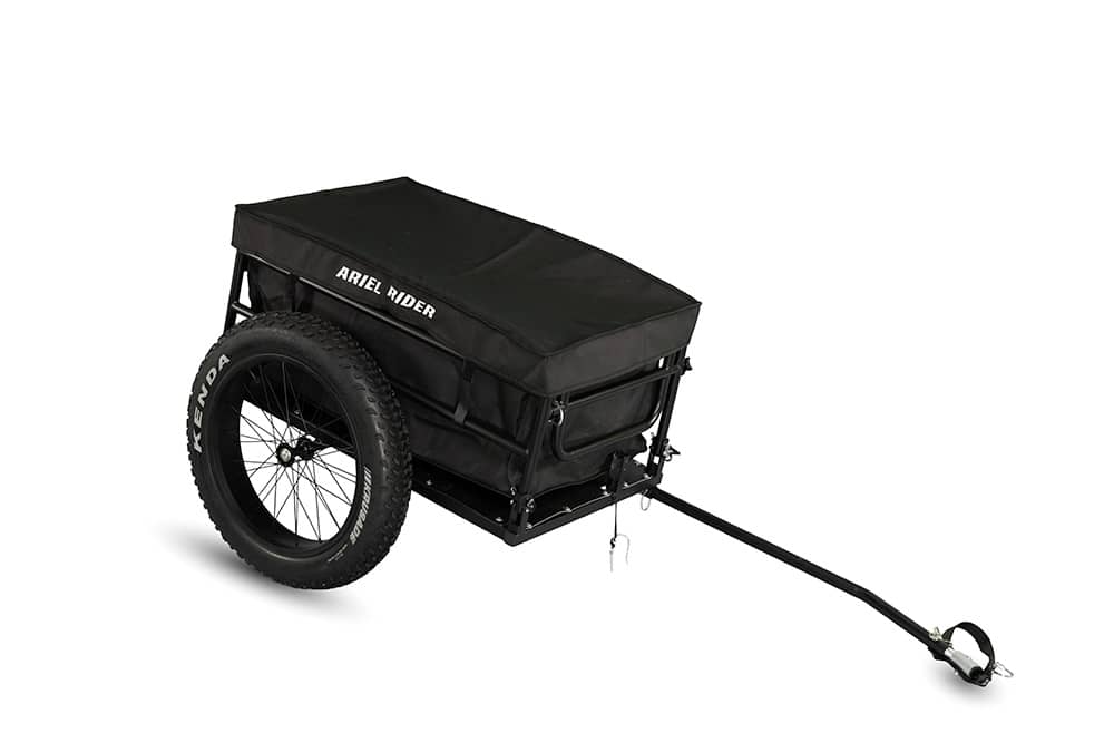 Ariel Rider cargo trailer with black fabric cover installed, angled side view.