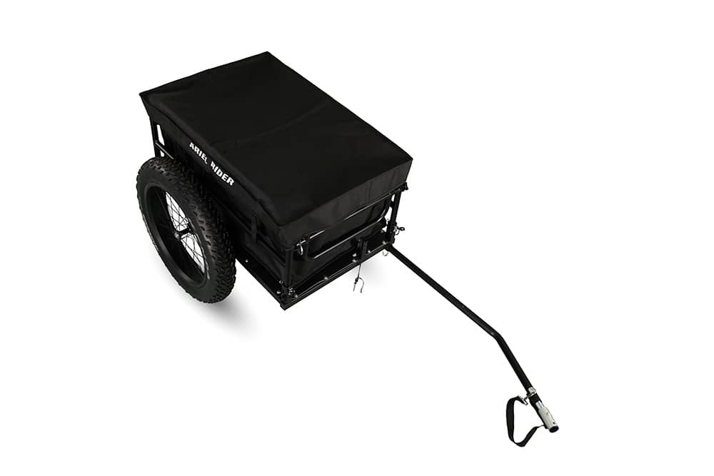 Top-down angle of Ariel Rider electric bike cargo trailer with closed black cover.
