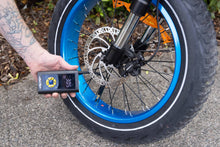 Load image into Gallery viewer, Compact digital air pump with an LCD display for precise pressure control, ideal for e-bike and bicycle tires.