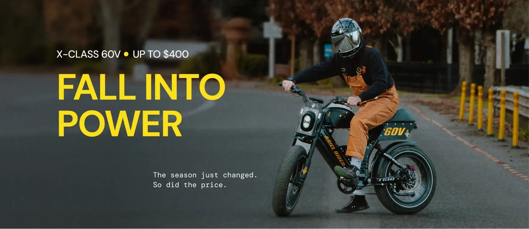 Ariel Rider X-Class 60V fall 2025 sale banner showing a rider in brown overalls cornering on the powerful 60V ebike.