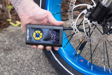 Load image into Gallery viewer, Rechargeable electric air pump with USB compatibility, designed for quick inflation of e-bike tires and portable use.